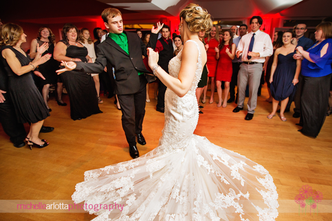 bride spinning on dance floor at rock island lake club