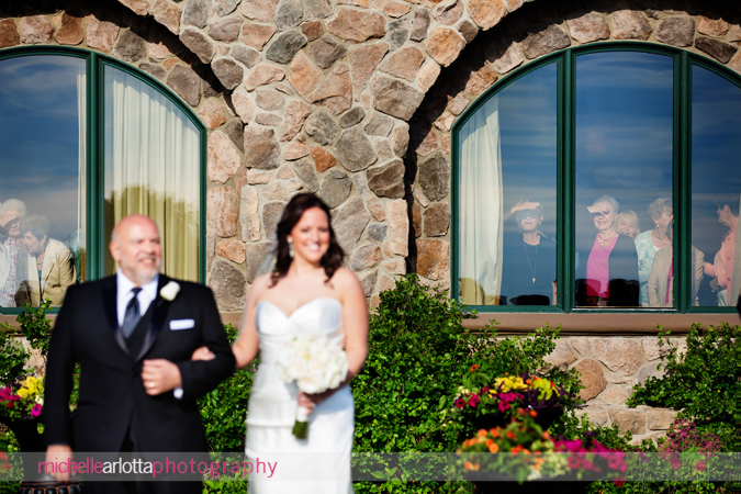 onlookers at wedding at grand cascades lodge