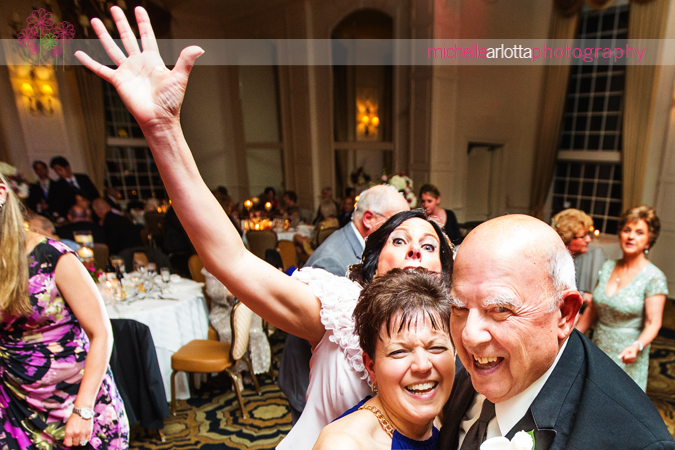 mother of the bride photobombing during reception