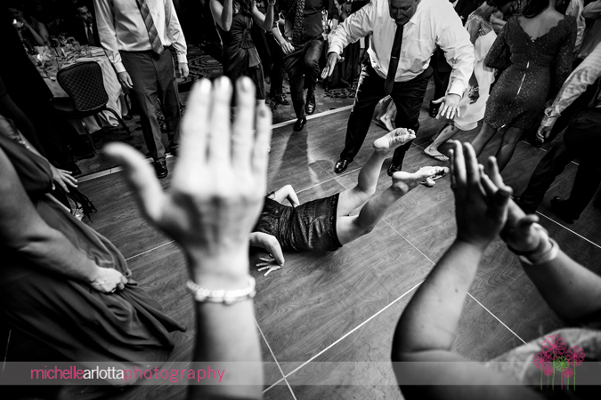 guest doing the worm at grand cascades lodge new jersey wedding