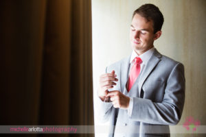 gray suit coral tie