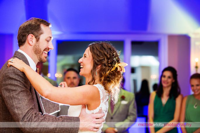 bride and groom have first dance during rock island lake club wedding reception by New Jersey wedding photographer michelle Arlotta photography