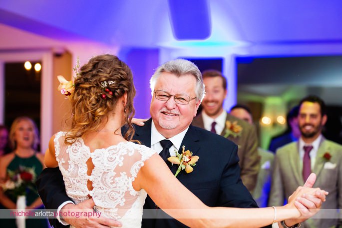 bride and her dad dance during rock island lake club wedding reception by New Jersey wedding photographer michelle Arlotta photography