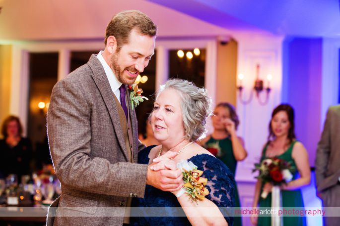 groom and his mom dance during rock island lake club wedding reception by New Jersey wedding photographer michelle Arlotta photography