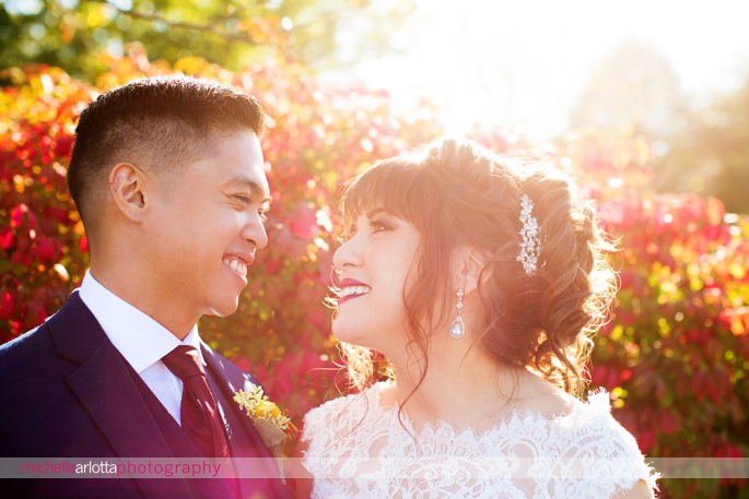 bride and groom sun flare portrait at battleground country club photographed by nj wedding photographer michelle Arlotta