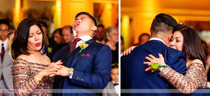 groom in blue suit dances with mom at battleground country club wedding reception