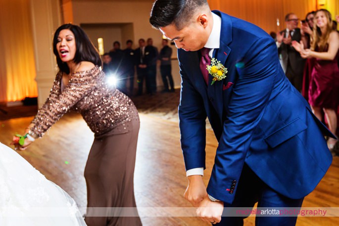 groom and mother dance to gangam style at wedding reception in New Jersey