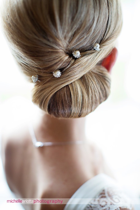 bridal beauty of brotherhood winery bride with Nicole miller NYC wedding gown and elegant up-do