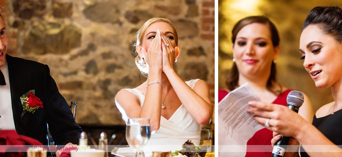 bride covers her mouth while laughing during wedding speeches at brotherhood winery wedding in the Hudson valley ny