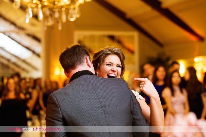bride points and laughs at groom during first dance at New Jersey wedding with michelle Arlotta photography