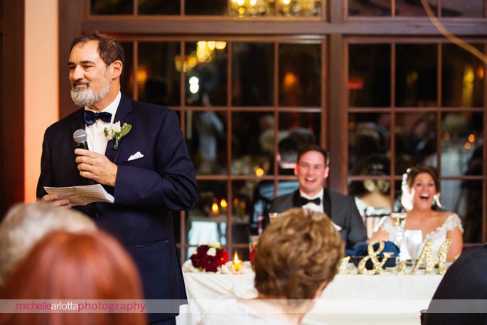 father of the bride toasts bride and groom during New Jersey wedding reception