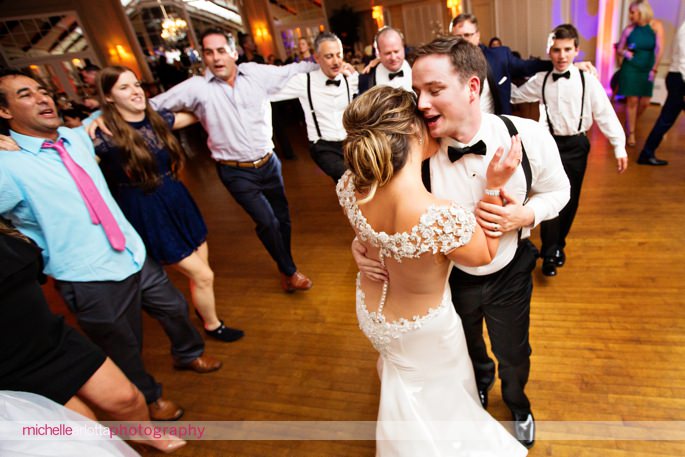 bride and groom dance together for last song of their lake mohawk country club wedding reception