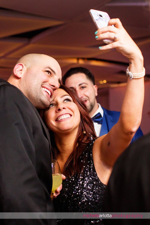 wedding guests take a selfie at maritime Parc wedding