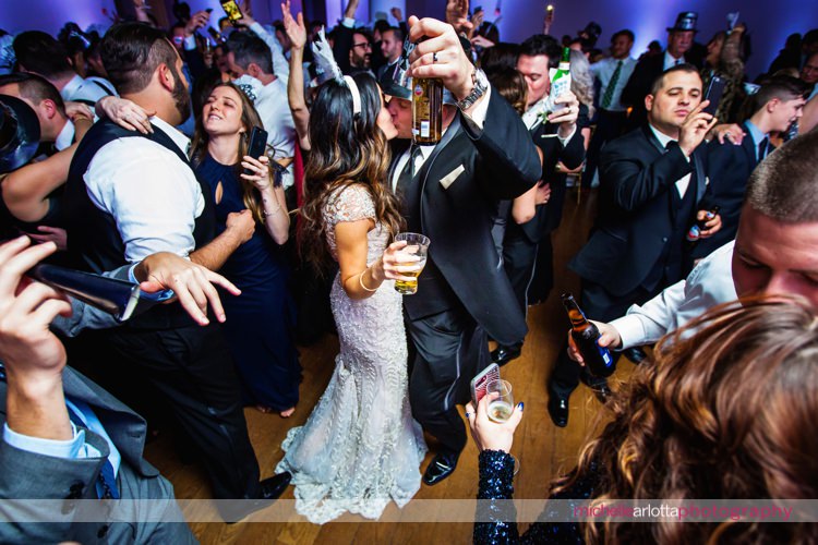 bride and groom kiss at new year's at New Jersey wedding