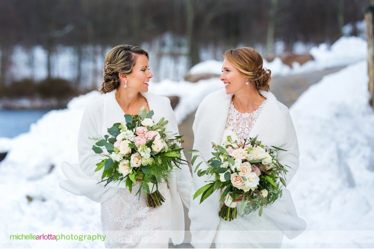 brides with white shawls and bouquets by atoe events at New Jersey same sex wedding