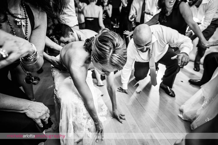 bride and guests get down on floor for shout played by dj Paul Knox