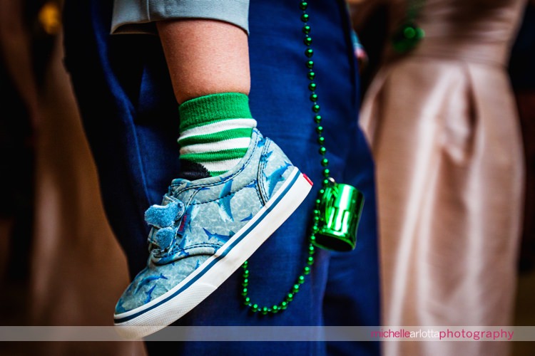 tiny green mugs and shark shoes for st Patrick's day wedding