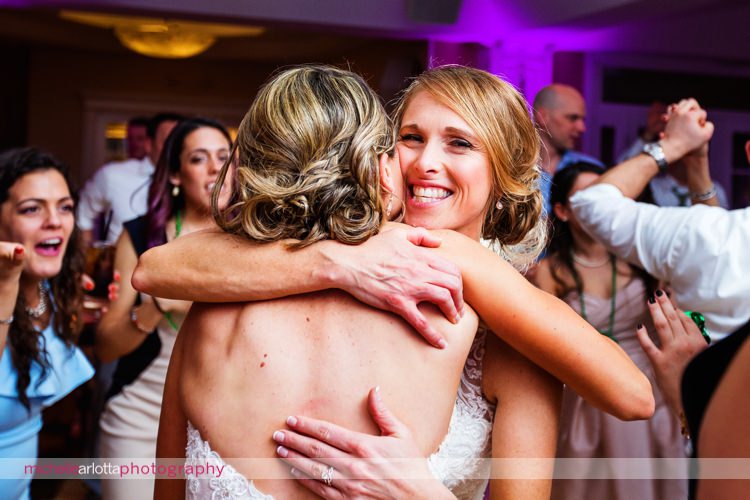 brides dance together during New Jersey same sex wedding reception