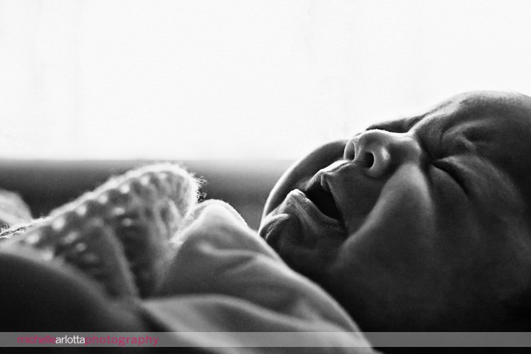 black and white close up of nj newborn girl crying