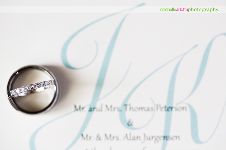 wedding invitation with turquoise accents with wedding rings