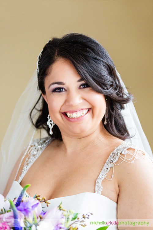 portrait of New Jersey bride Deanna in the white gown wedding dress flowers by gala florist and hair and makeup by amazing face nj at rock island lake club spring wedding