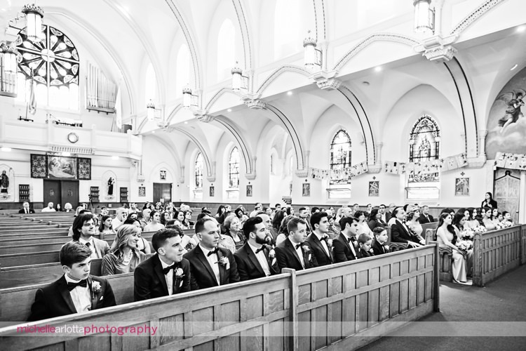 bridal party and guests at wedding ceremony at sacred heart church on staten island