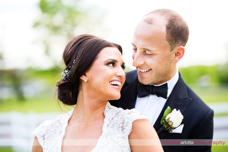 bride and groom smiling and looking at one another during New Jersey Ryland inn wedding