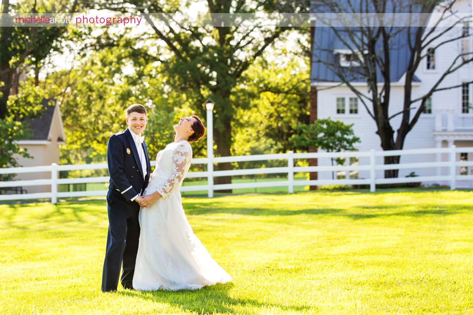 New Jersey bride in lacy dress with groom in Air Force uniform at their ryland inn