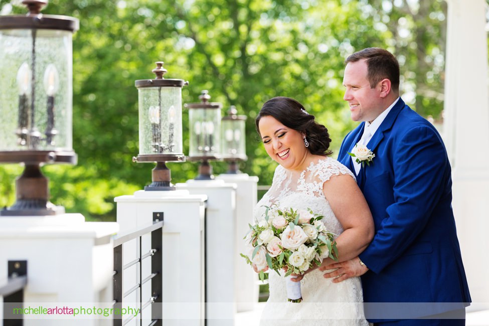 bride in pronovias dress groom in blue suit portrait at New Jersey bear brook valley sunny summer wedding
