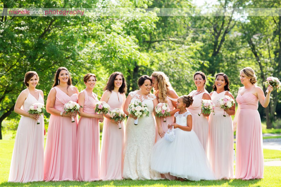 bridesmaids in pink dresses at bear brook valley wedding venue in New Jersey