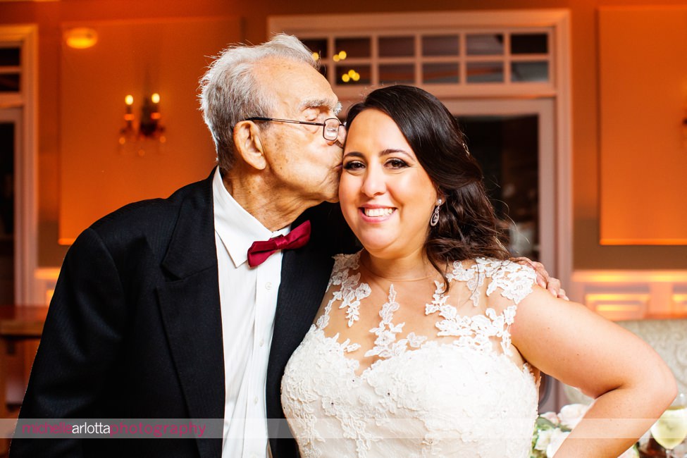 grandfather kisses brides at bear brook valley New Jersey wedding reception 