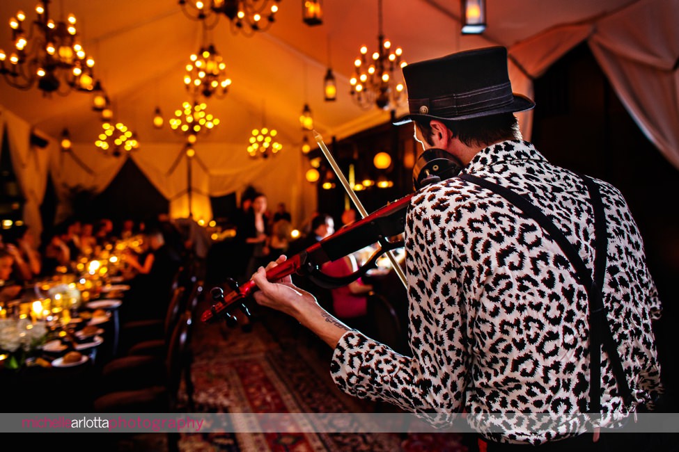 violin Shane plays during rooftop nomad hotel nyc engagement party
