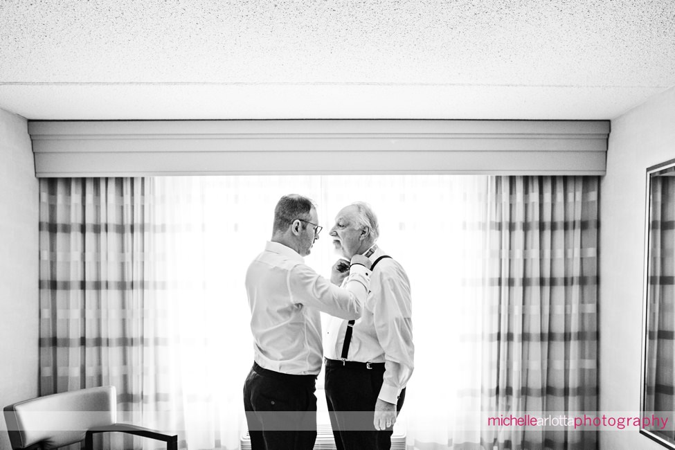 Bear Brook Valley Winter Wedding New Jersey groom helping father with bowtie