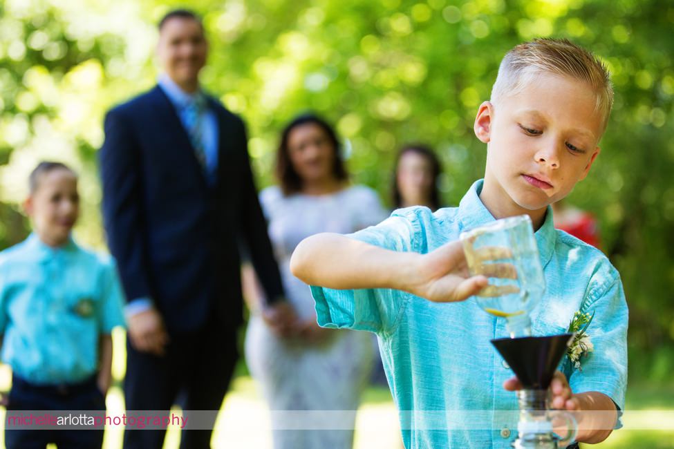 intimate summer backyard Frenchtown New Jersey wedding sand ceremony bride and son walk down aisle