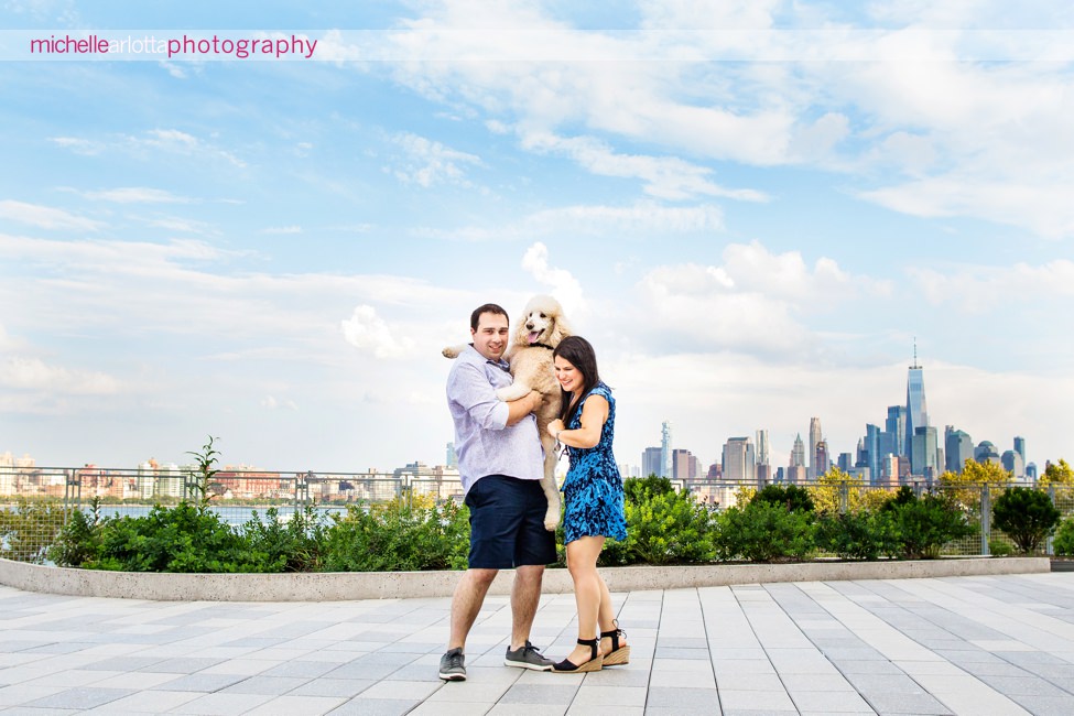 couple with standard poodle at Stevens institute Hoboken engagement session