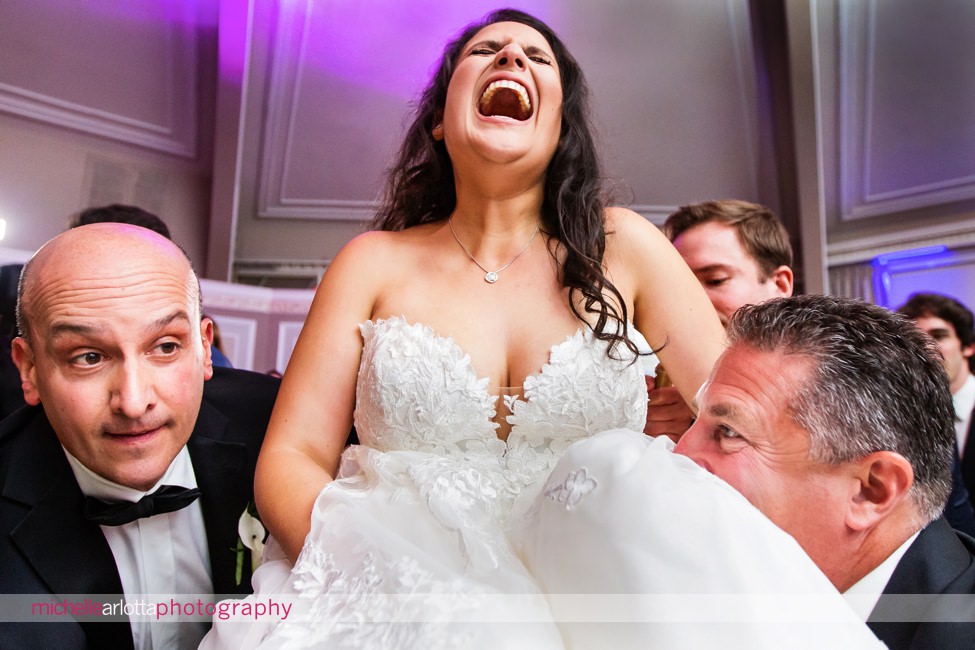 View on the Hudson NY wedding reception jewish horah bride gets lifted in chair