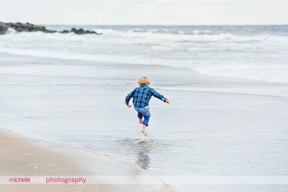 Asbury Park nj family photos little boy jumping in water