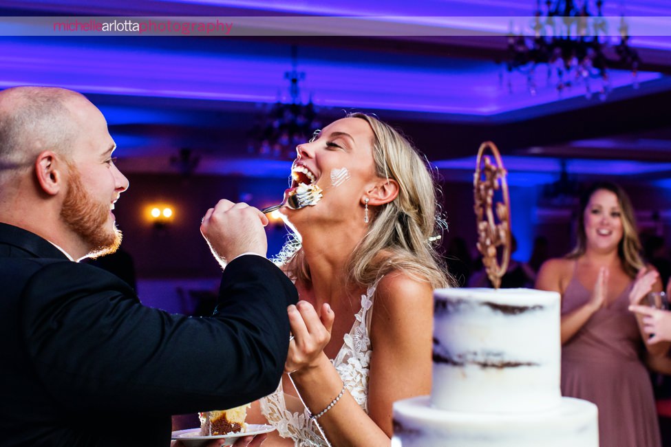 bear brook valley autumn wedding nj reception groom shoves cake in bride's face