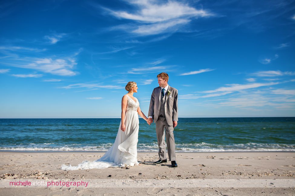 Martell's water's edge New Jersey wedding bride and groom beach portraits