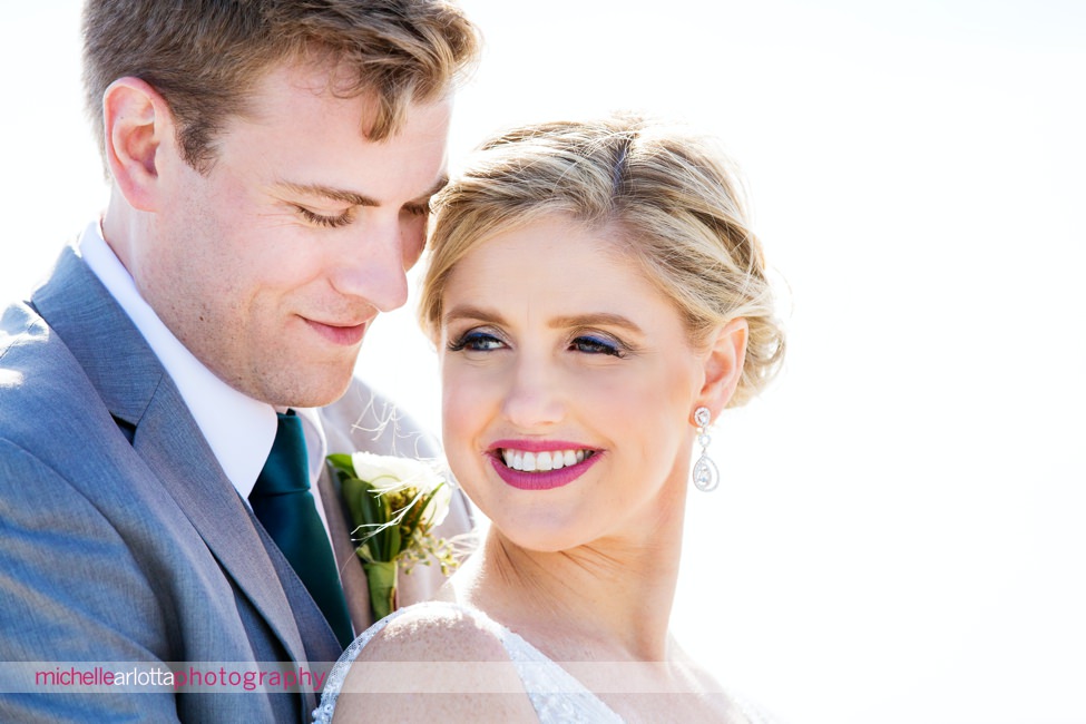 Martell's water's edge New Jersey wedding bride and groom beach portraits