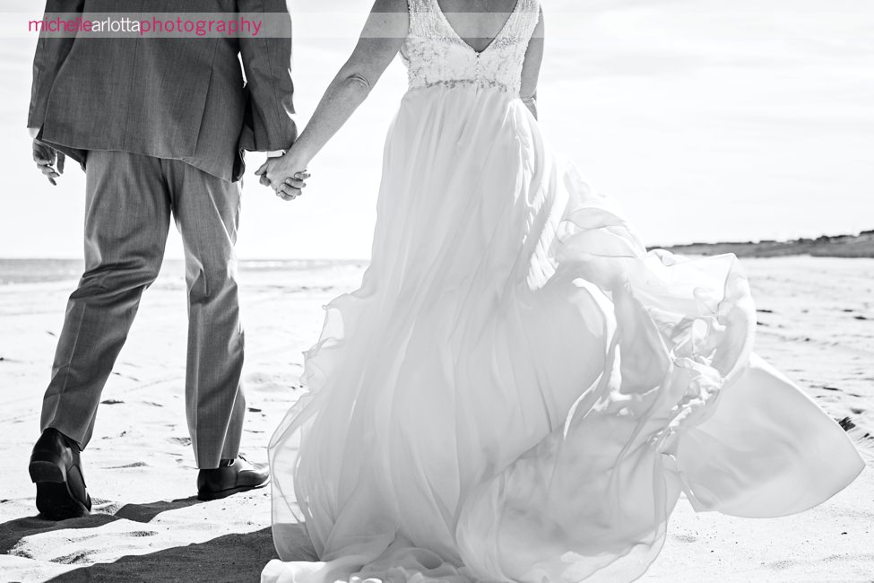 Martell's water's edge New Jersey wedding bride and groom beach portraits