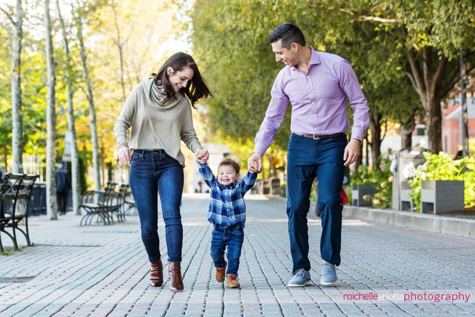 toddler with parents during Hoboken family session