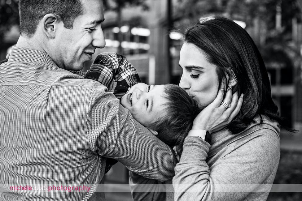 toddler with parents during Hoboken family session
