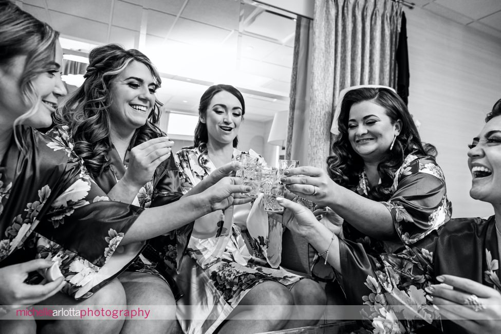 Edgewood country club wedding bride and bridesmaids matching robes tequila shots