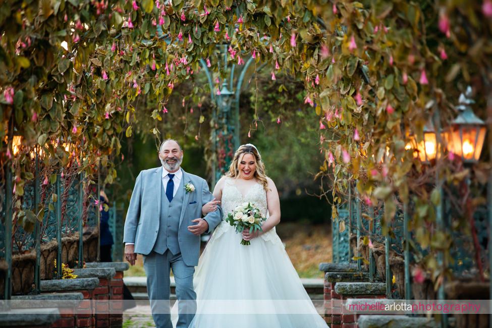 The manor NJ outdoor wedding ceremony bride walks down aisle