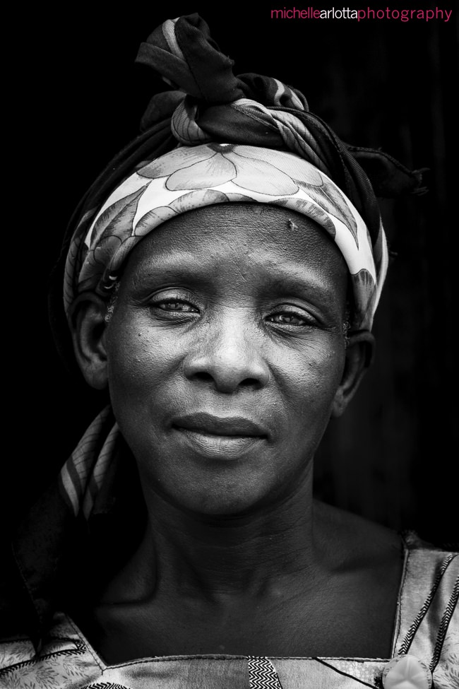 fly contact black and white portrait Ugandan woman