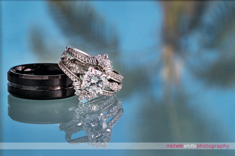 San Diego wedding wedding rings with palm tree reflection