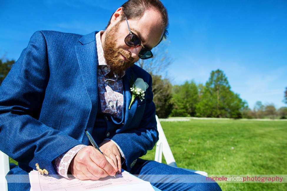 colonial park gardens New Jersey intimate wedding ceremony signing the marriage license