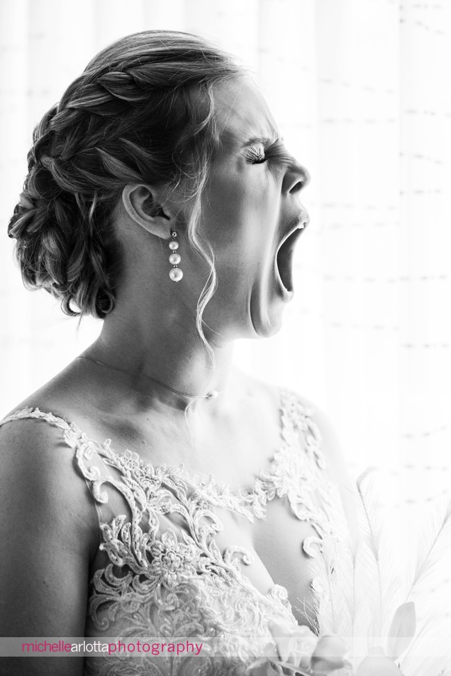 Waterloo village wedding bride yawns during portrait