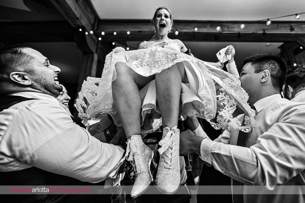 Waterloo village wedding reception horah showing bride's boots